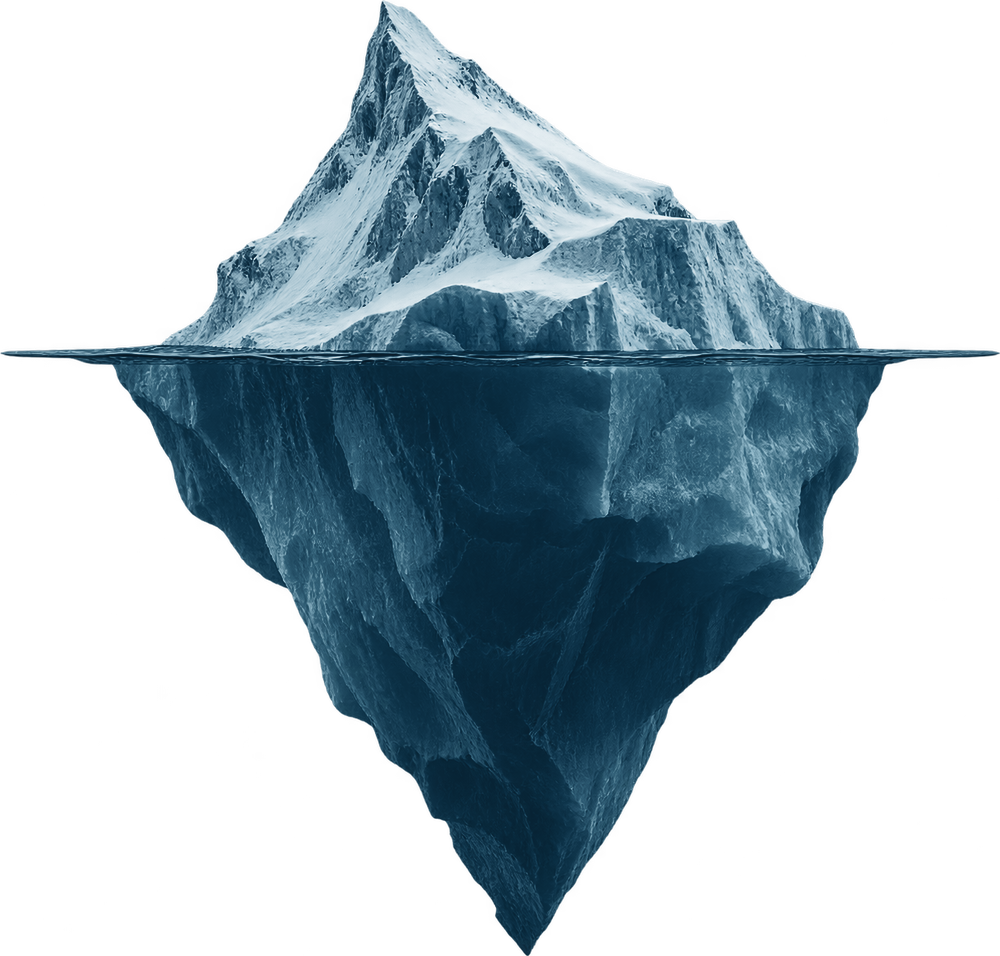 An iceberg at the waterline: a snow-covered peak above, and a far larger mass below the surface